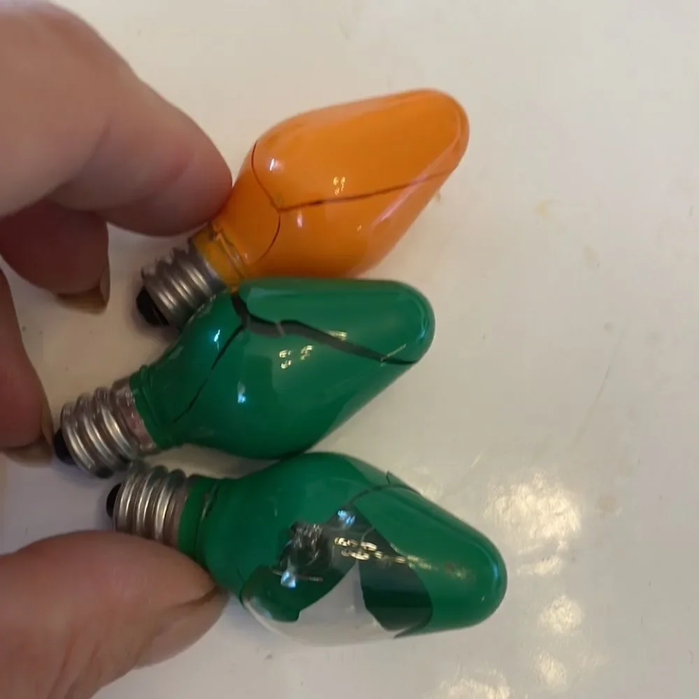 Collection of 21 painted Christmas lamp bulbs/various colors‎